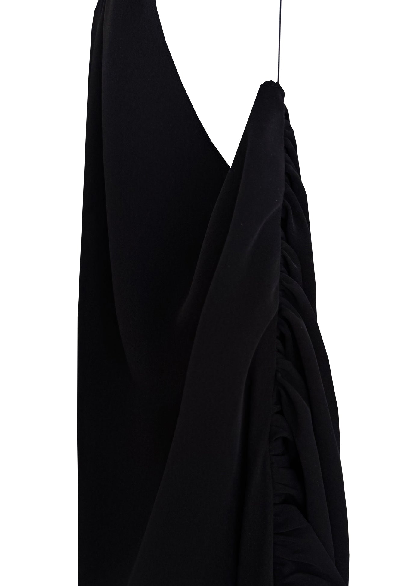 Black dress on a mannequin against a white background