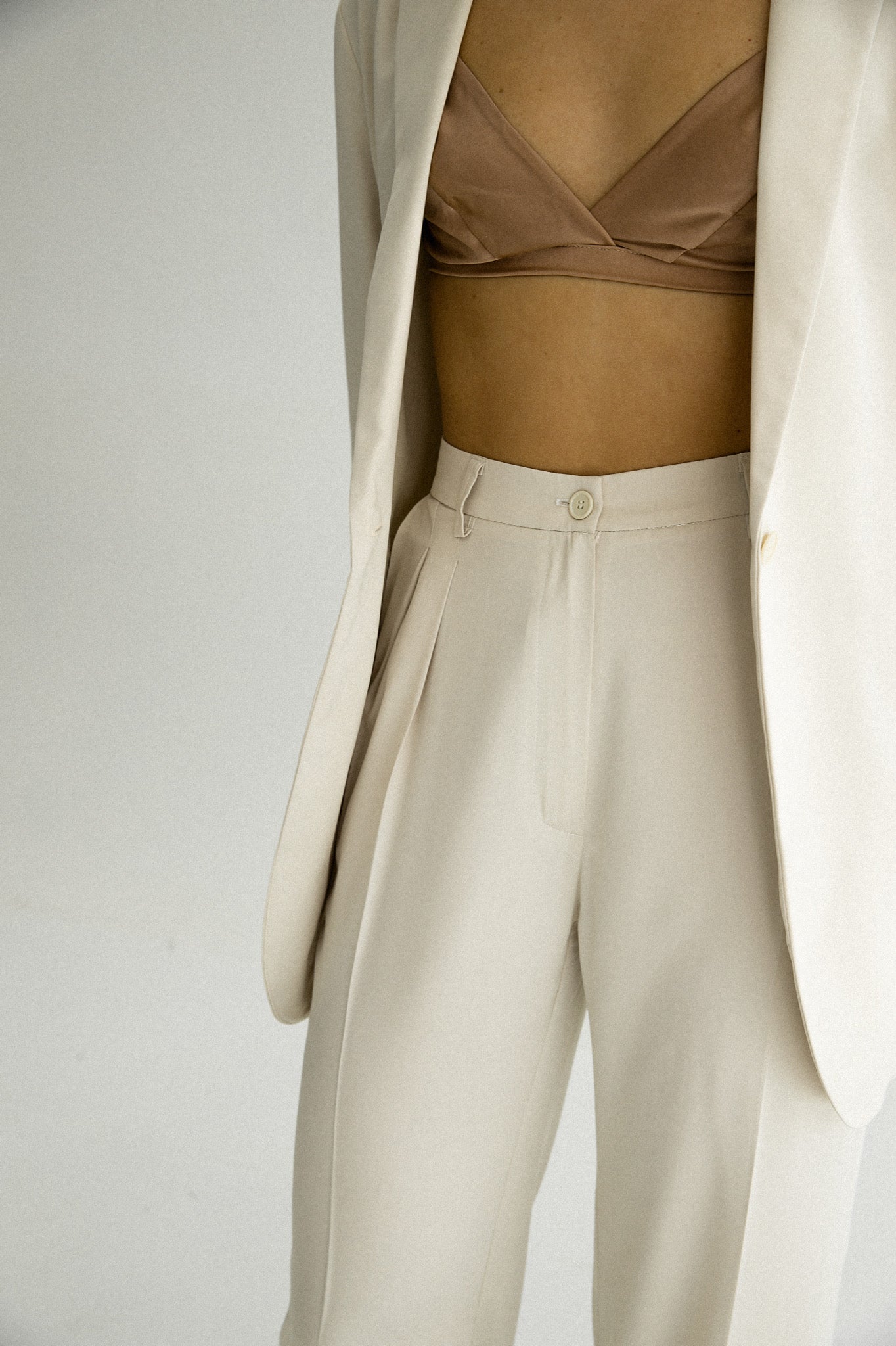 Satin trousers in cream