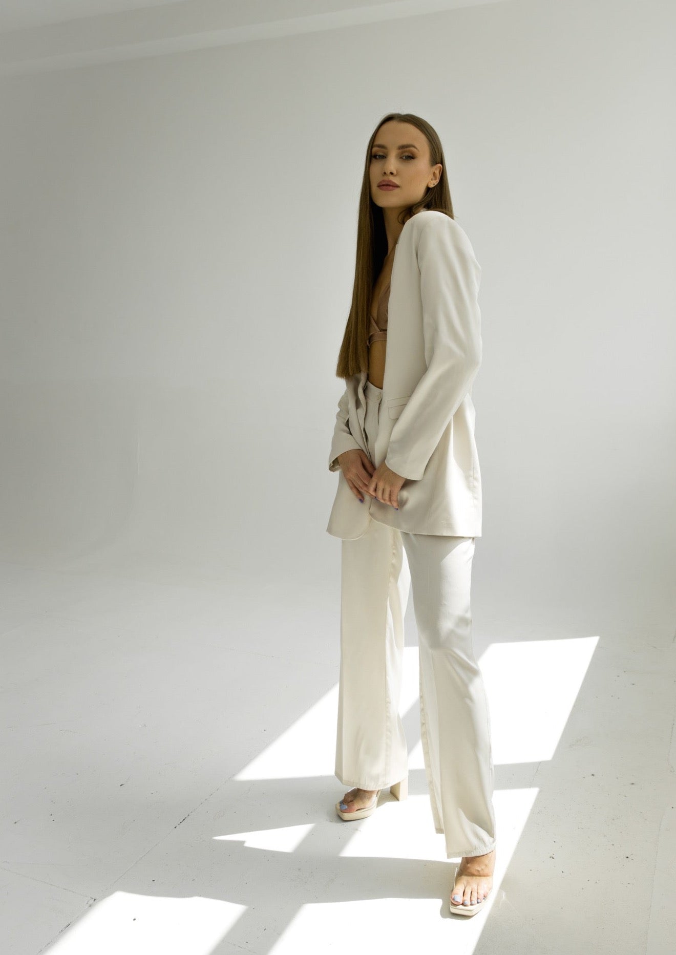 Satin trousers in cream