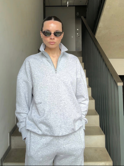 Half zip in storm melange