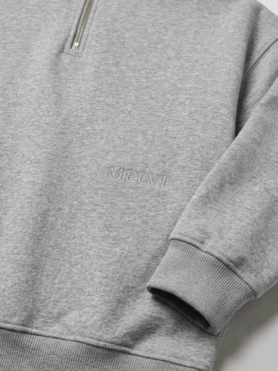 Half zip in storm melange