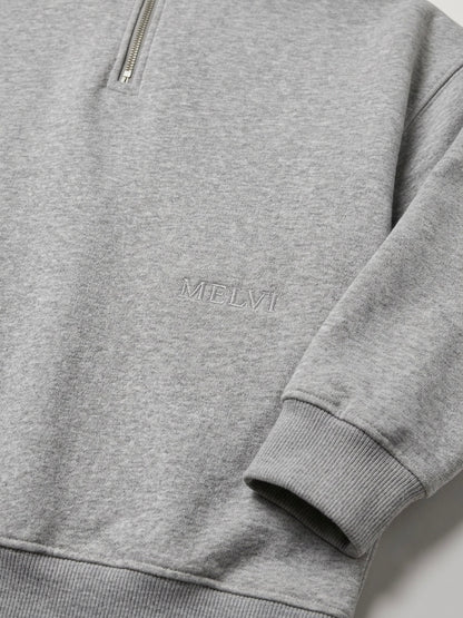 Half zip in storm melange